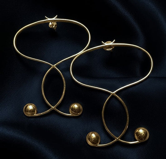 Les boucles d’oreilles Infinite - L.A.N.S