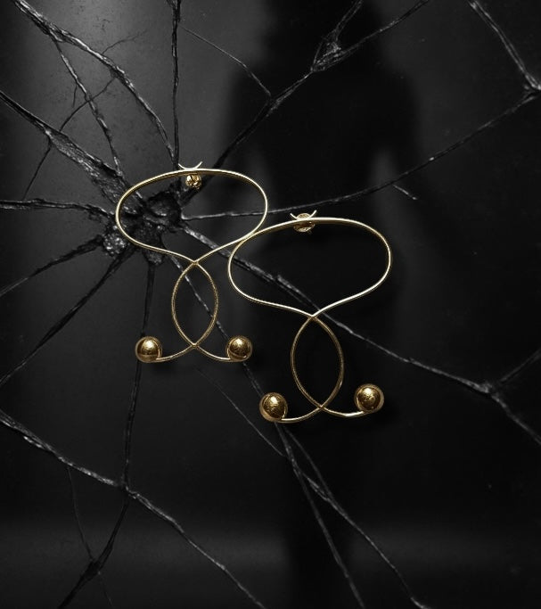 Les boucles d’oreilles Infinite - L.A.N.S